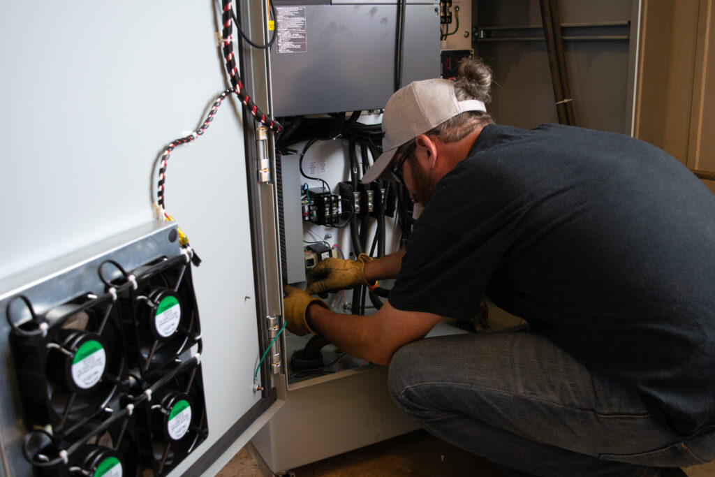 VFD tech installing VFD panel